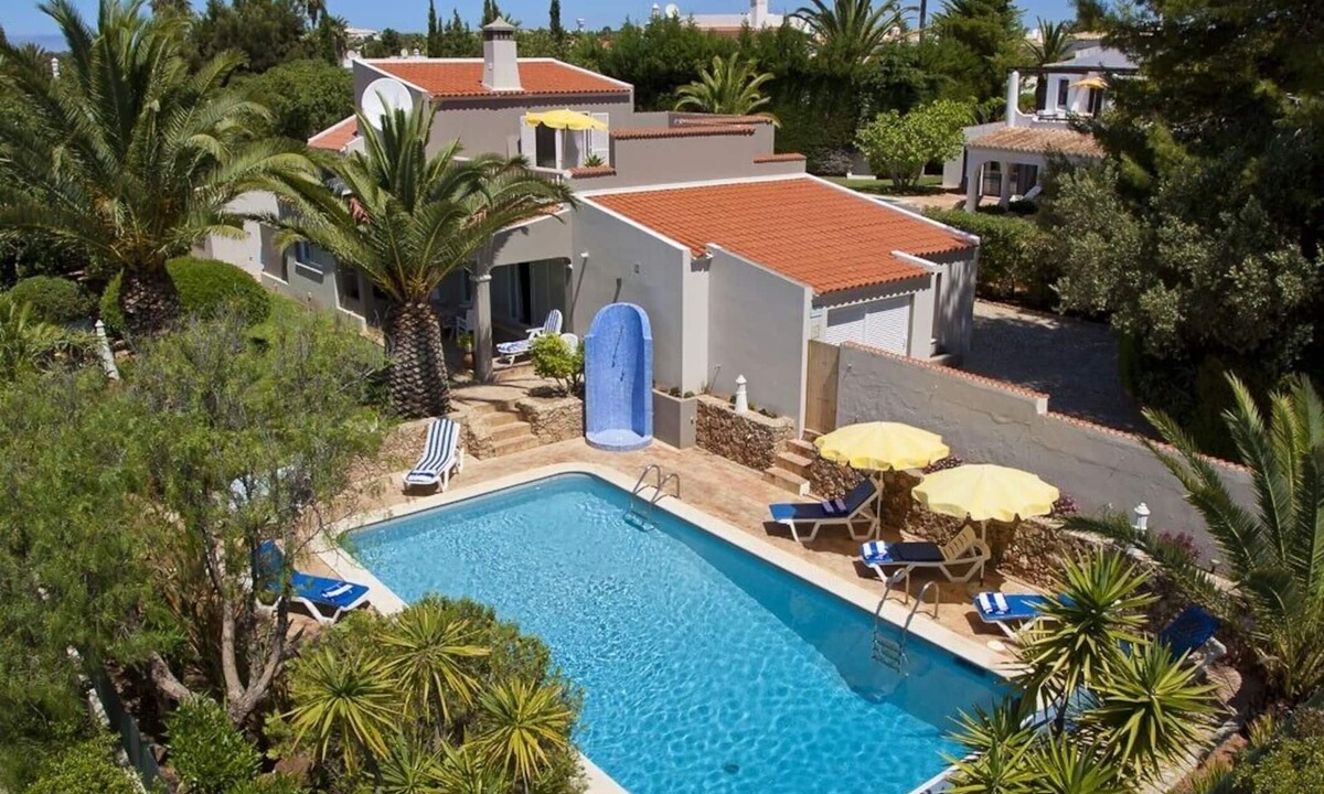 Carvoeiro House | A Caribbean vibe on the picturesque rocky Algarve coast, housekeeping service, heated saltwater pool