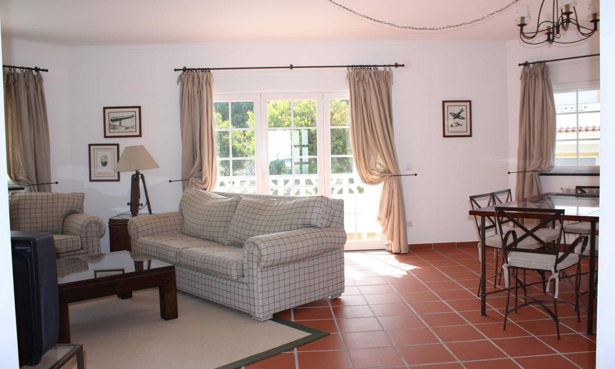 Praia del Rei Apartment | Apartment With Shared Pool, landscaped gardens, Wi-fi