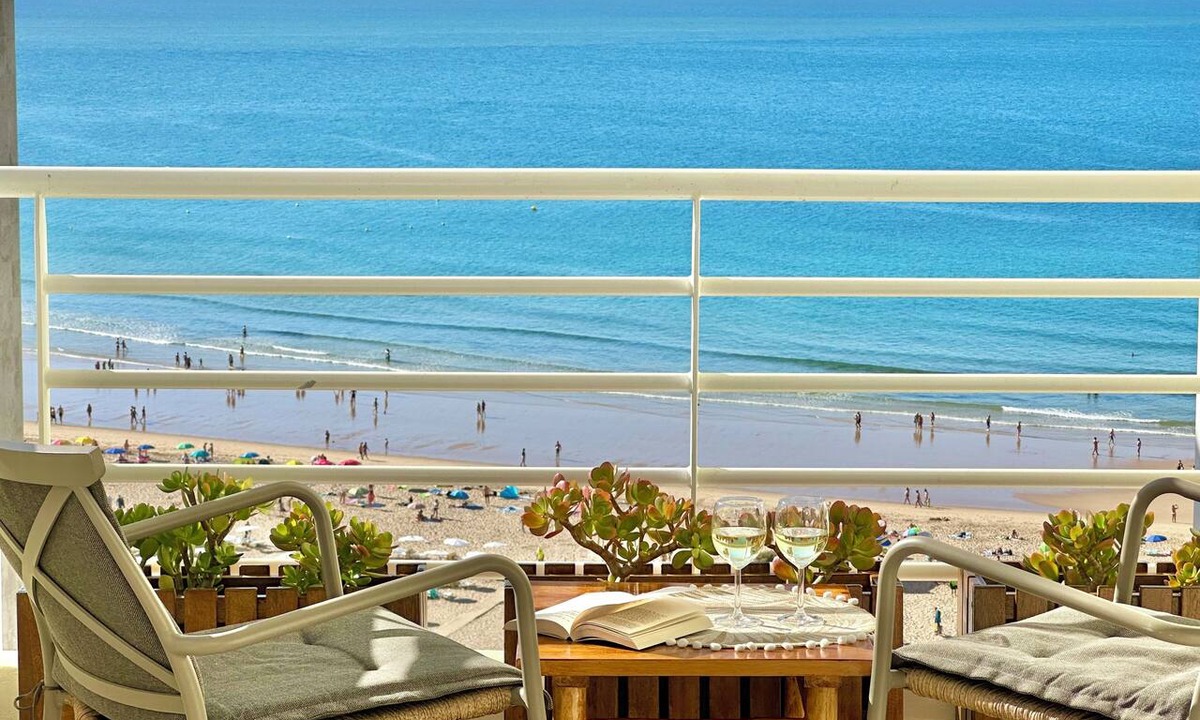 Praia da Rocha Apartment | Beachfront Moments · Stunning Ocean Views · Beach Access · Garage