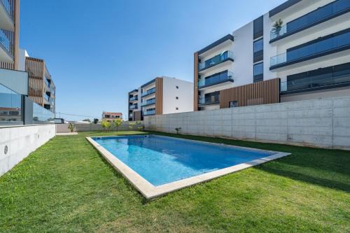 Penina Apartment | Elegant Retreat with Pool & Terrace by HostWise