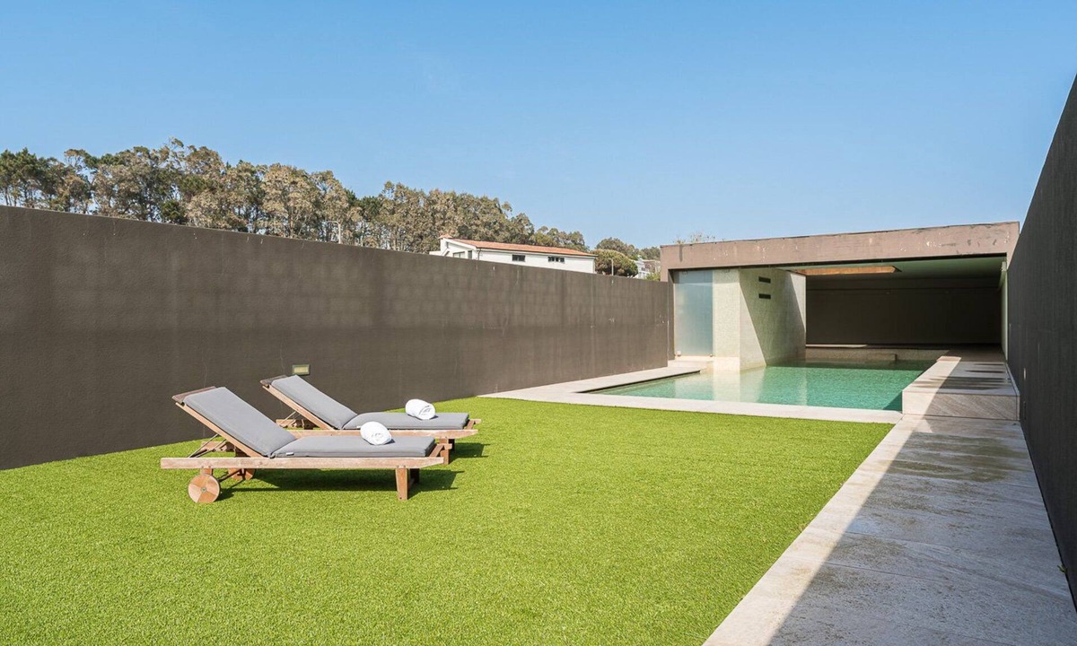 Madalena House | GuestReady - Luxurious Beachfront Villa Retreat
