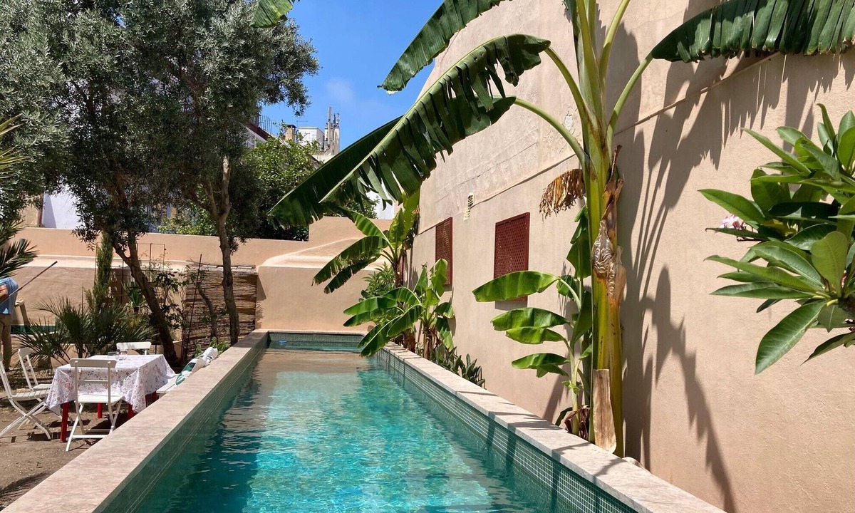 Belem Villa | Junqueira Gardens - a large, restored historic home with a garden and private pool