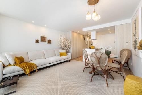 Fao Apartment | Riverside duplex by the sea with pool and balcony