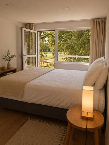 Lousa House | Tranquil 19th-Century Farmhouse Room in Lous, Portugal