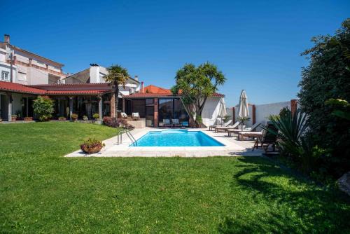 Fao House | Villa dos Corcéis