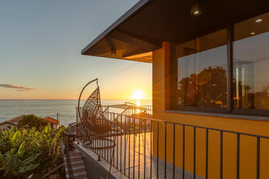 Paul do Mar Villa | Yellow by the sea house by CAELIS INSPIRE