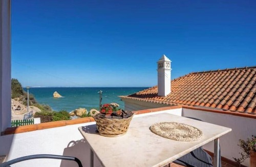 Lagos Apartment | A charming, historic apartment with a terrace right on the beach