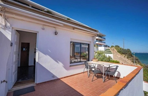 Lagos Apartment | A charming, historic apartment with a terrace right on the beach