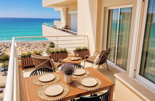 Praia da Rocha Apartment | Beachfront Moments · Stunning Ocean Views · Beach Access · Garage