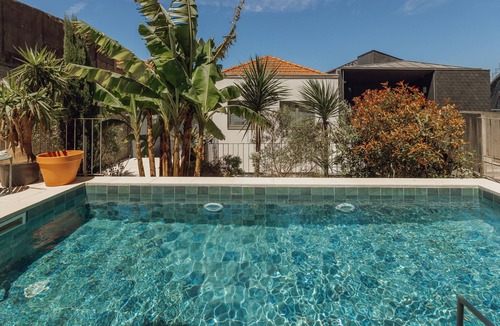 Santa Marinha Apartment | Bridge Pool Retreat by Vacationy