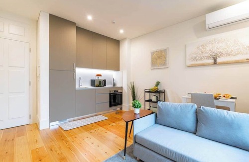 Oliveira do Castelo Apartment | Bright & Cozy Flat w/Balcony by Host Wise
