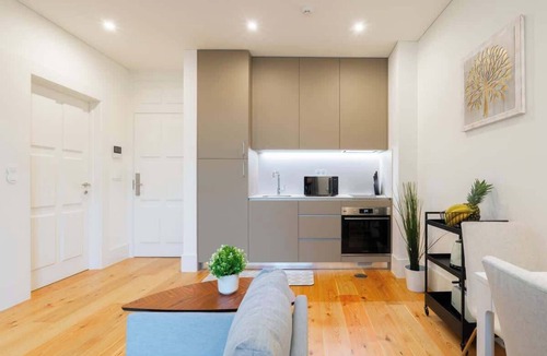 Oliveira do Castelo Apartment | Bright & Cozy Flat w/Balcony by Host Wise