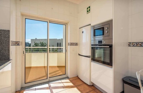 Porto de Mos Apartment | Bright & Stylish Lagos Flat with Pool by HostWise