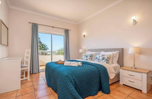 Porto de Mos Apartment | Bright & Stylish Lagos Flat with Pool by HostWise