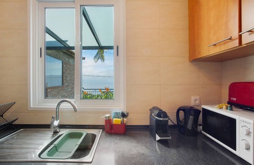 Santo Antonio Apartment | Capelos Country House with Sea View, Private Garden, and Wi-Fi
