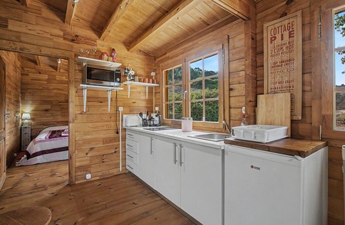 Caldas da Rainha Ski Chalet | Chalet 'Orange Lodge' with Shared Pool, Private Terrace and Wi-Fi