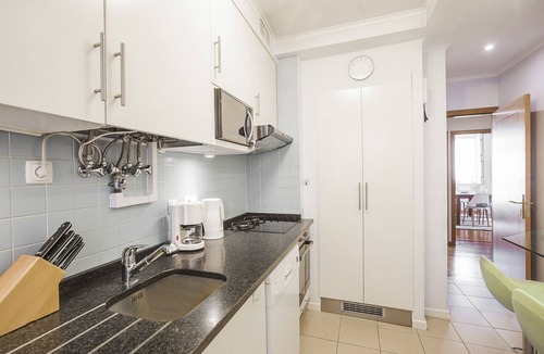 Santa Maria Maior Apartment | Chic 2-Bed Lisbon Center Oasis | Elevator, Private Balcony, A/C & WiFi