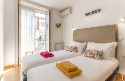 Santa Maria Maior Apartment | Chic 2-Bed Lisbon Center Oasis | Elevator, Private Balcony, A/C & WiFi