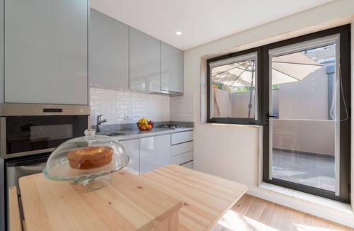 Maia Apartment | Cozy Studio with Pool Near Airport by HostWise