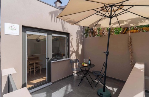 Maia Apartment | Cozy Studio with Pool Near Airport by HostWise