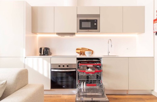 Centro / Baixa Apartment | Elegant 2BR w/Patio by LovelyStay