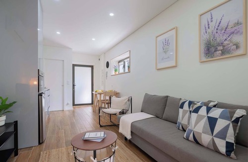 Maia Apartment | Elegant Flat with Pool Near Airport by HostWise