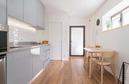 Maia Apartment | Elegant Flat with Pool Near Airport by HostWise