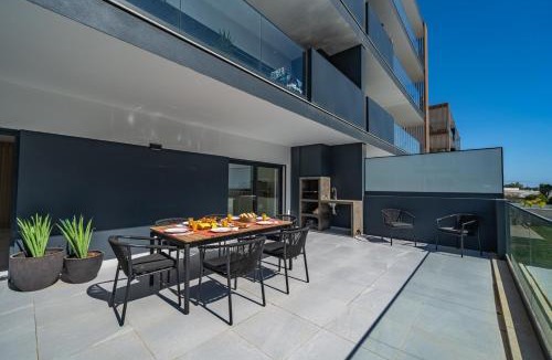 Penina Apartment | Elegant Retreat with Pool & Terrace by HostWise