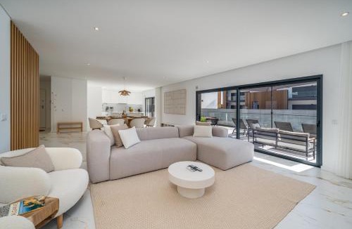 Penina Apartment | Elegant Retreat with Pool & Terrace by HostWise