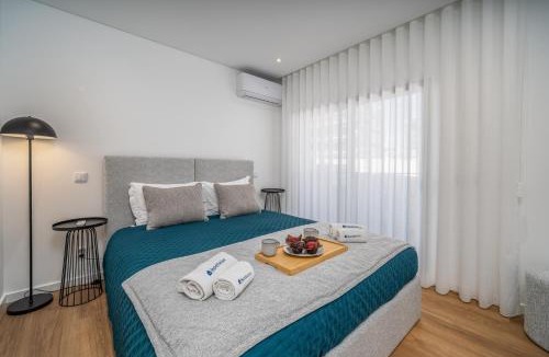 Penina Apartment | Elegant Retreat with Pool & Terrace by HostWise