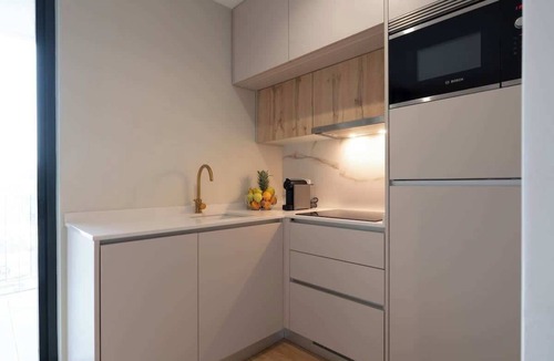 Santa Marinha Apartment | Elegant Studio w/Balcony & Garage by HostWise