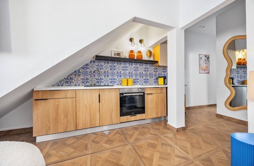 Alvor House | Enjoy exclusive use of two beautifully refurbished townhouses combined into one spacious 4-bedroom home in Alvor Old Town. Steps from the harbour, beach and restaurants, with sunny sea-view terraces jacuzzi, 2living rooms, 2kitchens, AC throughout.