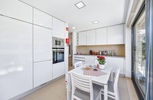 Quarteira Apartment | Experience ultimate relaxation in Quarteira's beachfront paradise.