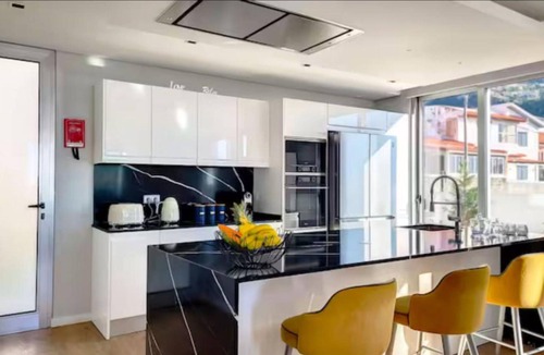Santa Luzia House | Ferienvilla "Villa Paradise Palms" by Interhome