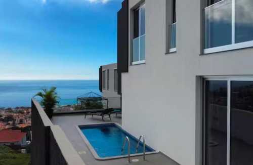 Santa Luzia House | Ferienvilla "Villa Paradise Palms" by Interhome