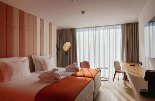 Sao Jorge de Arroios Hotel | Historic Lisbon at Your Door—Unwind in Pool Tranquility & Watch Light Show