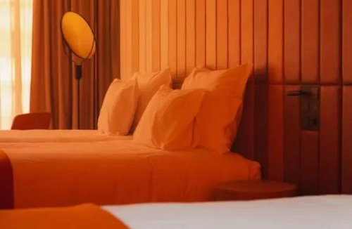 Sao Jorge de Arroios Hotel | Historic Lisbon at Your Door—Unwind in Pool Tranquility & Watch Light Show