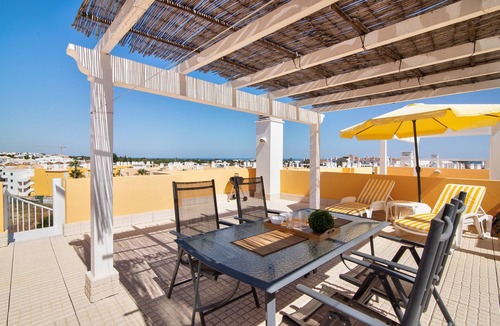 Canada Apartment | Holiday Apartment "Royal Cabanas Golf 87" with Sea View, Shared Pool & Private Terrace