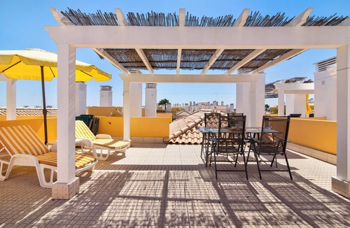 Canada Apartment | Holiday Apartment "Royal Cabanas Golf 87" with Sea View, Shared Pool & Private Terrace