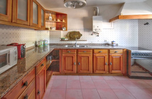 Sao Joao Batista House | Homerez - Charming House in Porto de Mós with Shared Pool