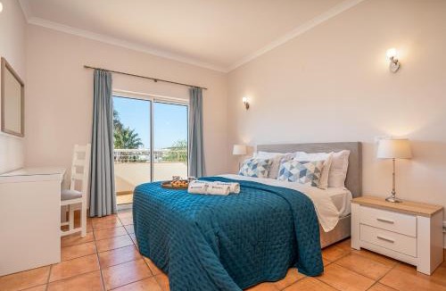 Porto de Mos Apartment | Host Wise - Bright & Stylish Lagos Flat with Pool