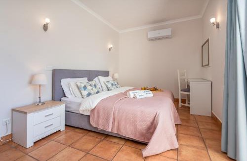 Porto de Mos Apartment | Host Wise - Bright & Stylish Lagos Flat with Pool