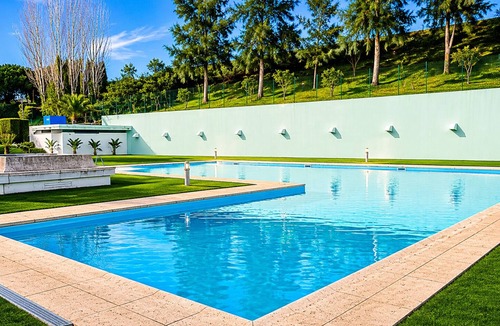 Carnide Apartment | Lisbon Luxury T1: Free Pool, Tennis, Gym, Game Room & Parking