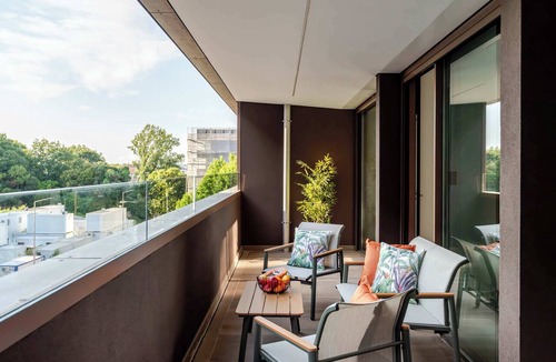 Santa Marinha Apartment | Luxury Living w/Rooftop Pool & Garage by HostWise