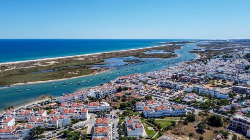 Conceicao e Cabanas de Tavira Apartment | Modern 2BR Apt w- Pool & Balcony, Steps To Ria Formosa