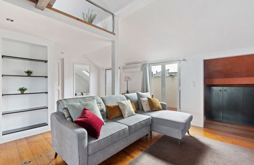Santo Condestavel Apartment | Modern & Spacious Mezzanine Apartment with Balcony in Lisbon