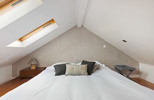 Santo Condestavel Apartment | Modern & Spacious Mezzanine Apartment with Balcony in Lisbon
