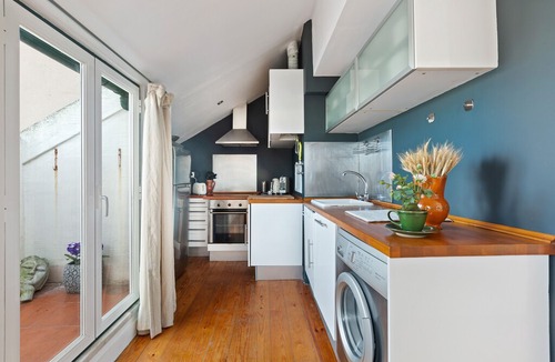 Santo Condestavel Apartment | Modern & Spacious Mezzanine Apartment with Balcony in Lisbon