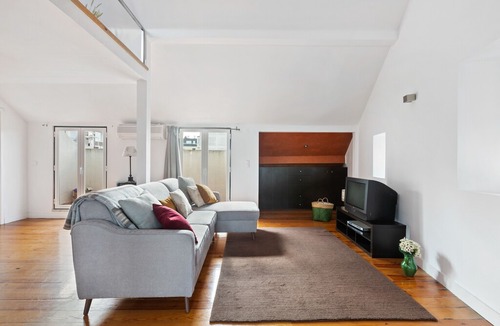 Santo Condestavel Apartment | Modern & Spacious Mezzanine Apartment with Balcony in Lisbon