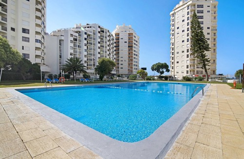 Armacao de Pera Apartment | Nau Bérrio 5ºD Apartment – Sea View, A/C, Wi-Fi, Garden & Balcony